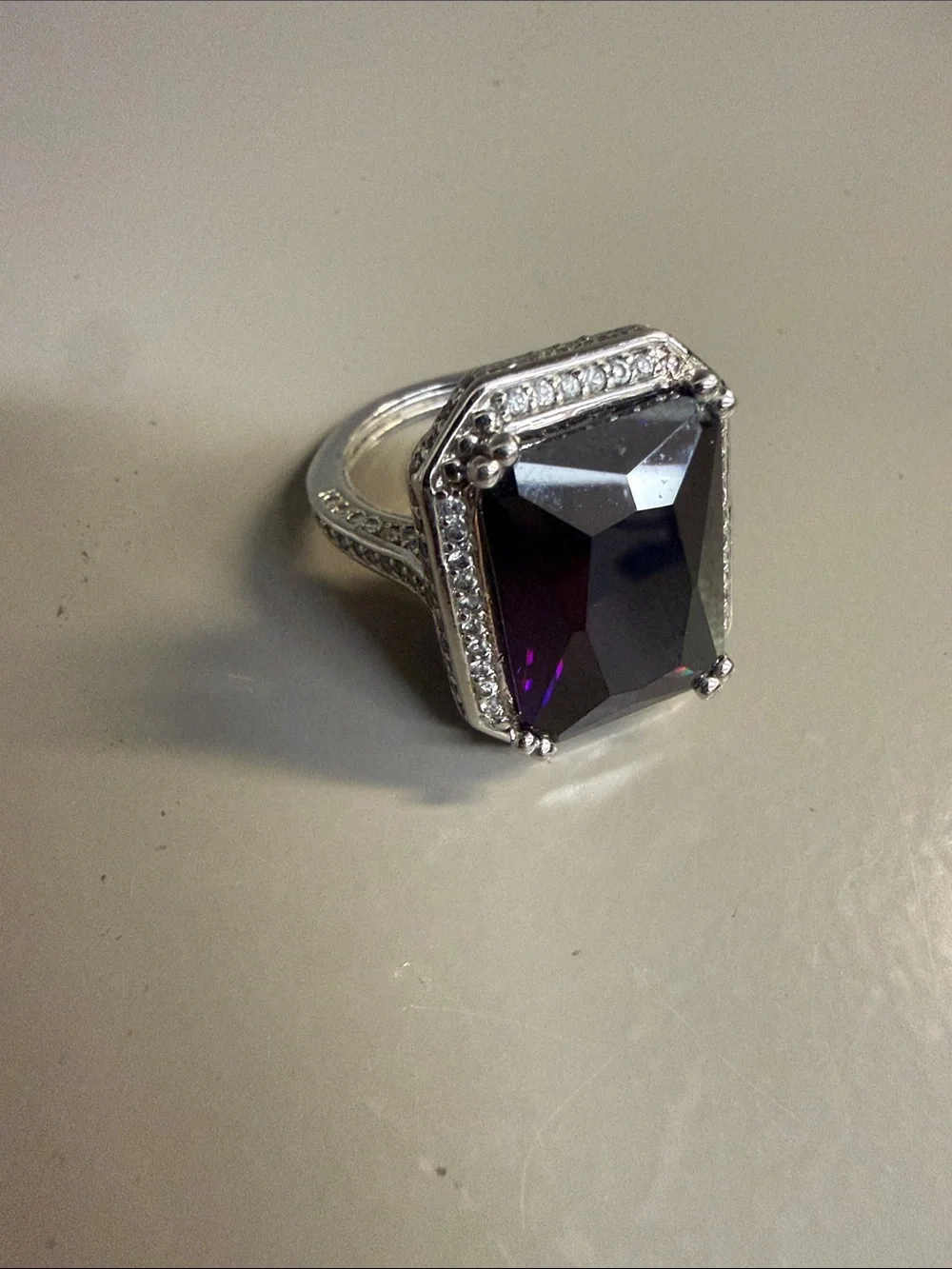 Avon Silver Tone Style Cocktail Ring Featuring a Large Glass Purple Gemstone